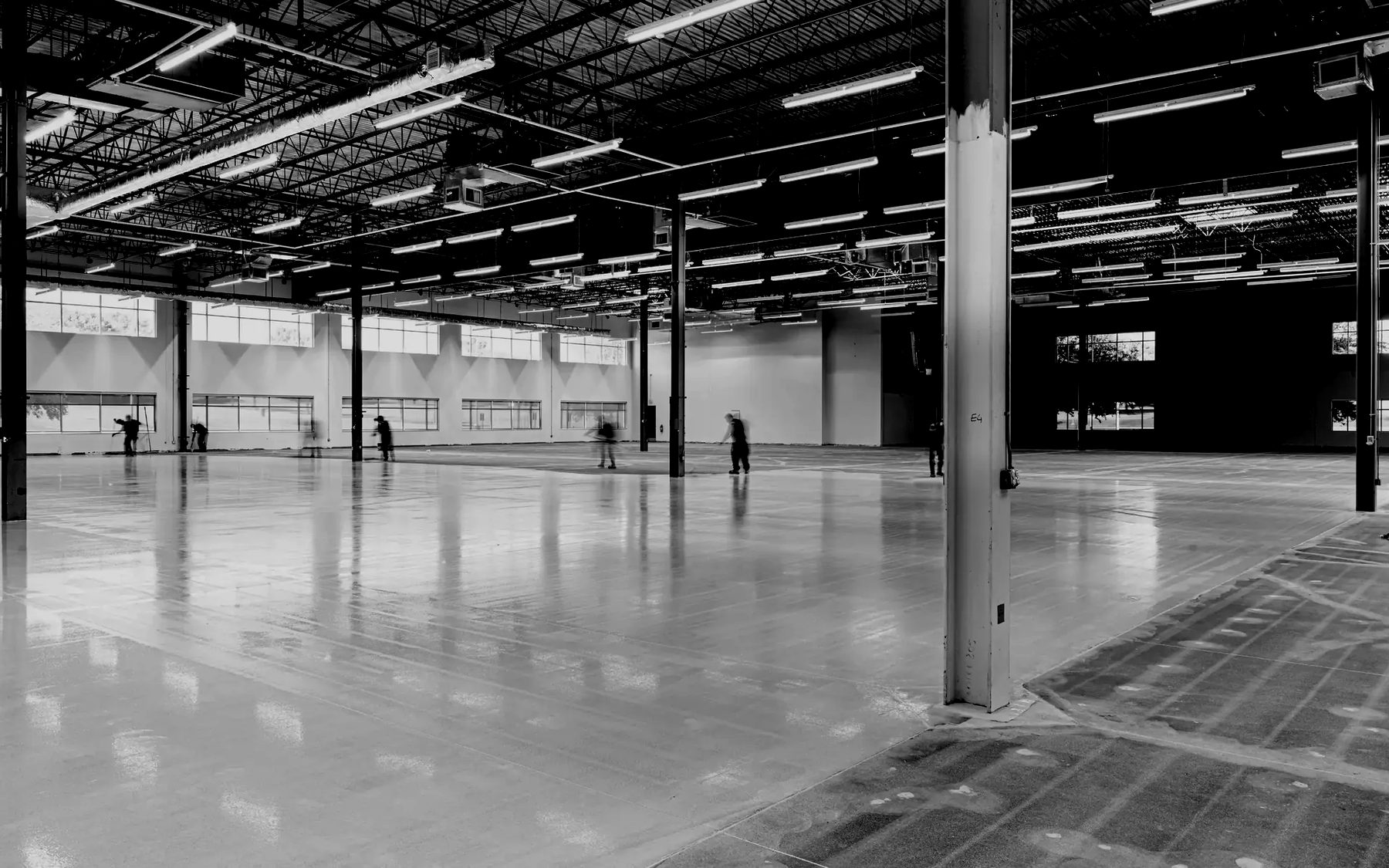 A large empty hall nearing completion