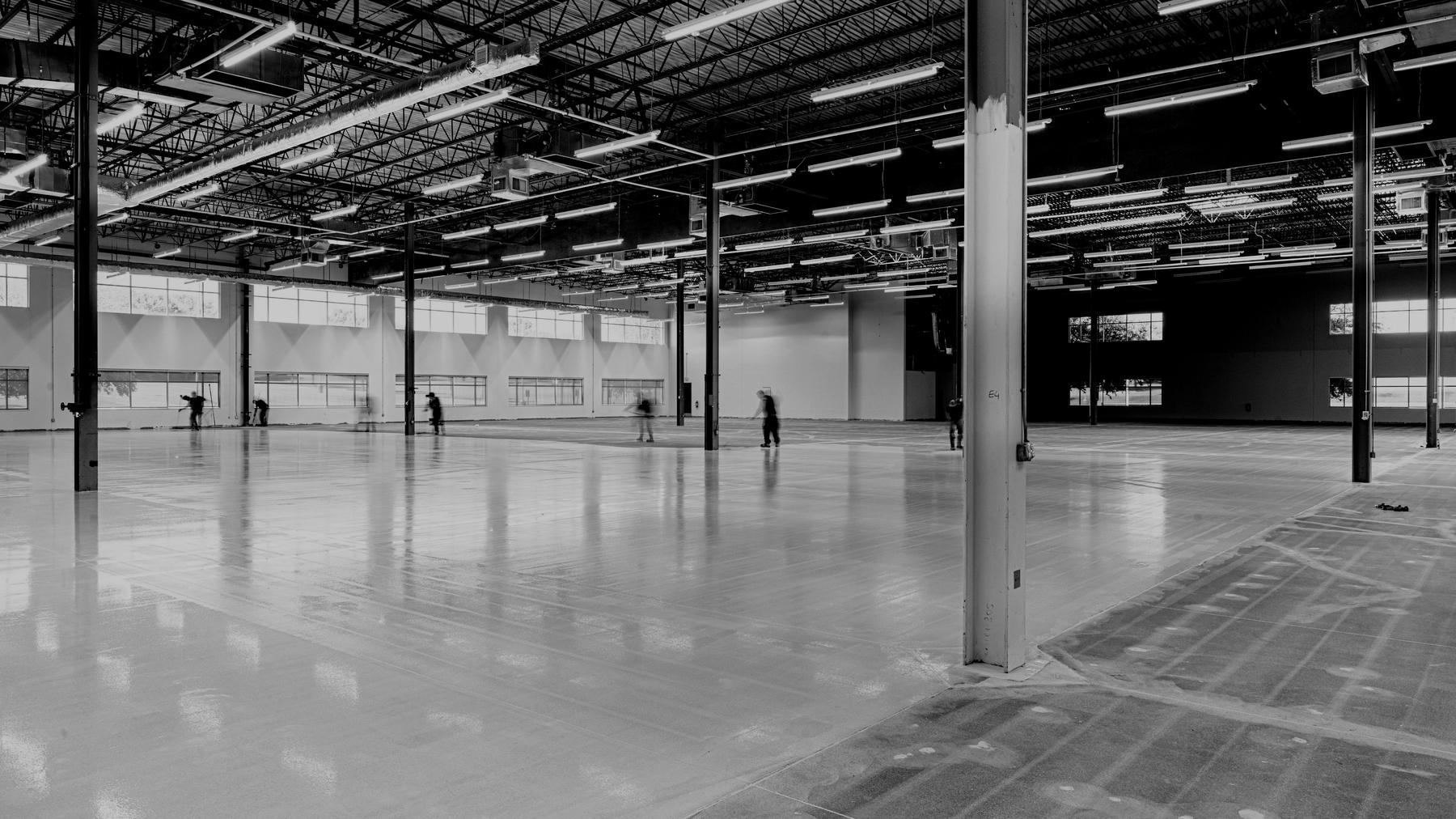 An empty new hall with a polished concrete floor
